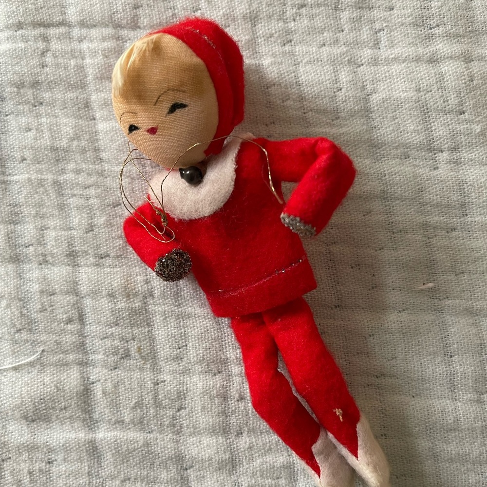 One red felt elf from the 1950s-1960s. 4 inches long.